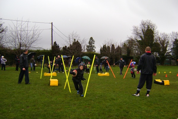 Our training starts at 10am Sunday mornings and typically we can be found on Healeys Corner. We welcome all children in their first years of school to come and try Rugby. Girls and Boys - everyone welcome Our training starts at 10am Sunday mornings and typically we can be found on Healeys Corner. We welcome all children in their first years of school to come and try Rugby. Girls and Boys - everyone welcome