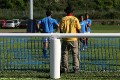 Mo watches the Samoan warm up